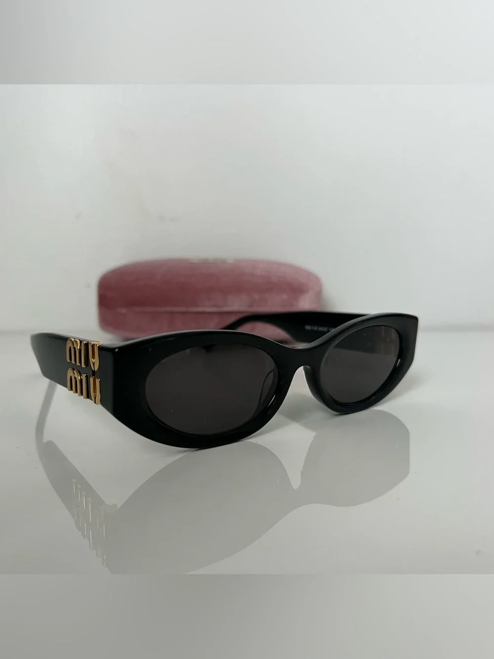 Miu Miu excellent condition—